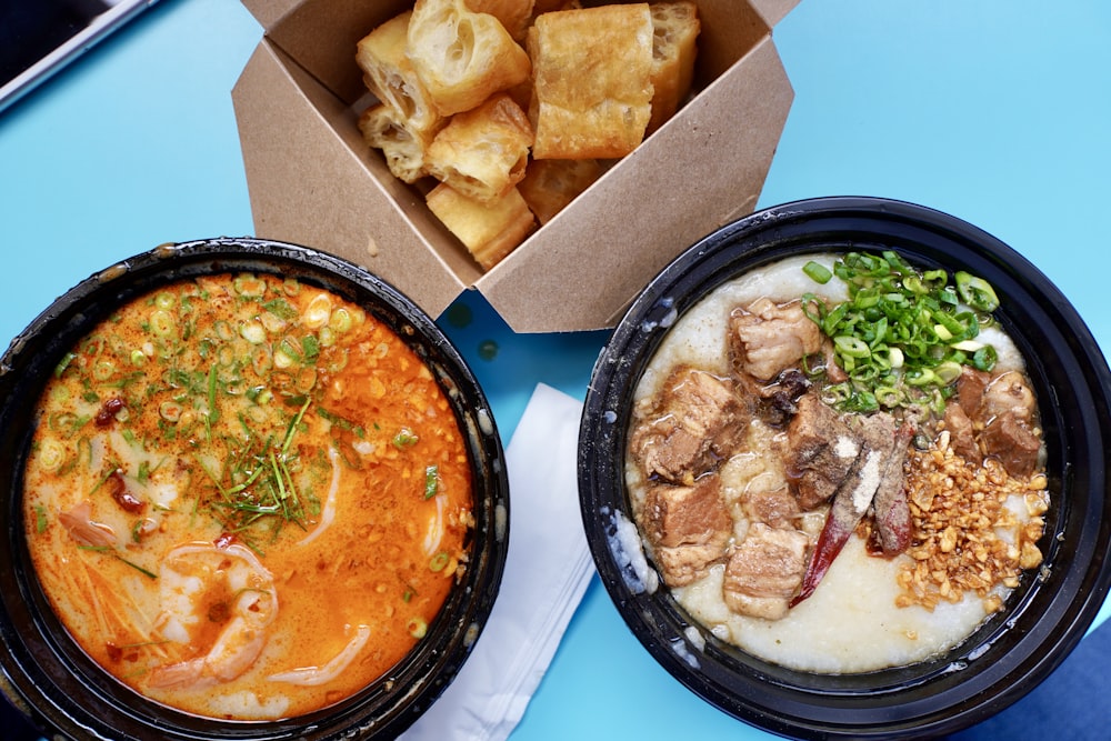 A bowl of congee, smooth rice porridge, with toppings
